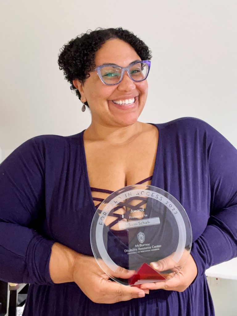 Sami Schalk posing with her access award